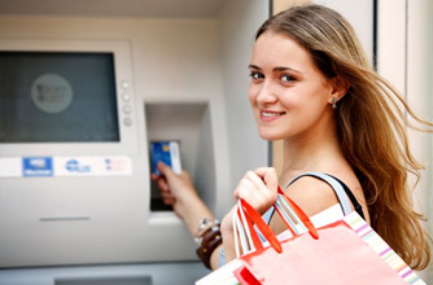 teenager-at-cashpoint